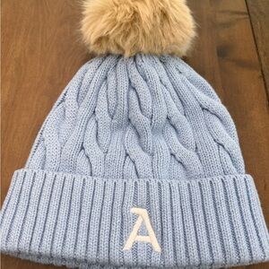 Light Blue Mark and Graham Knit Beanie with Pom Pom and an A monogram on it
